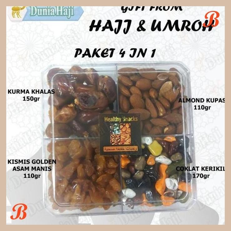 

| DH | PAKET HAJI UMROH 4 IN 1 KURMA KACANG ALMOND COKLAT KERIKIL KISMIS