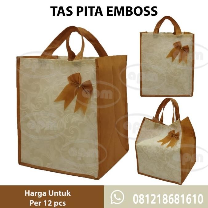 

Tas Spunbond Pita Emboss Muat 2 Box Ukuran 20x20 cm / 22x22 cm murah