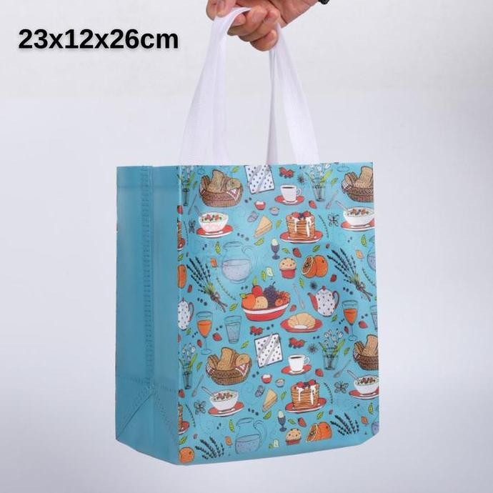 

Tas Spundbond/Goodiebag/Paper Bag Motif Kartun Uk 23x12x26cm