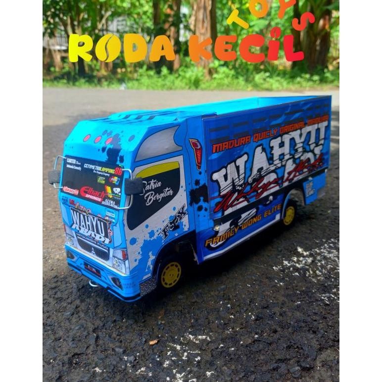 Mainan Anak Miniatur Truk Canter Oleng Wahyu Abadi Warna Biru Variasi Terpal Dan Lampu Kelip Menyala