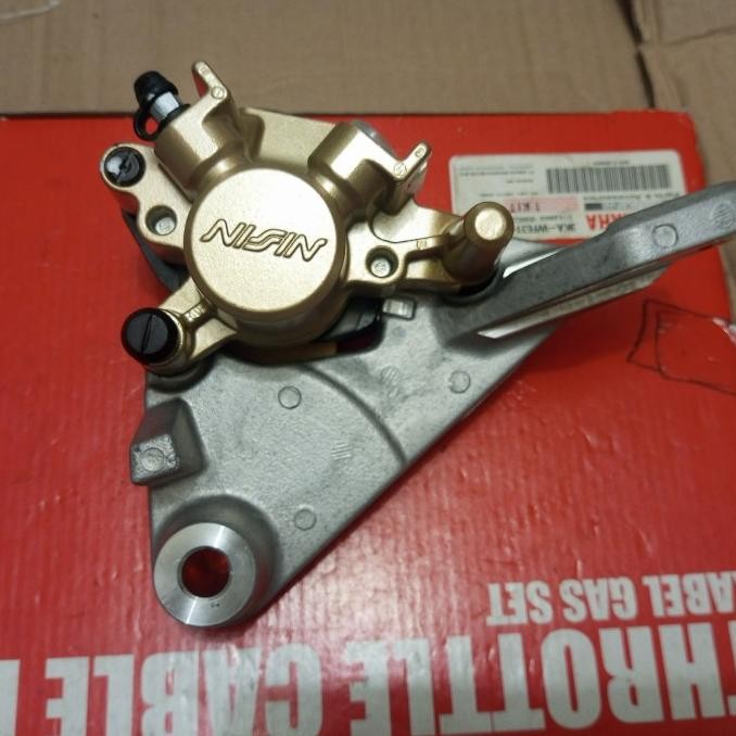 kaliper belakang Yamaha Jupiter MX new original Nissin set kampas ori