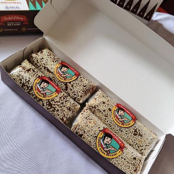 

Terlaris Dodol Betawi Lonjor Kecil Isi 4 Lonjor Kecil / Mini 1 Pcs 100 Gram Isi 4 Total Berat 4 Pcs 400 Gram / Dodol Wijen / Oleh Oleh Khas Jakarta Isi 4 Lonjor Per Kotak