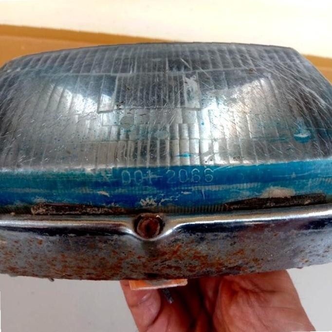 Sparepart dan Aksesoris kendaraan  Ring plus Lampu depan suzuKi Rc 100 bravo.  Second.  Original. be