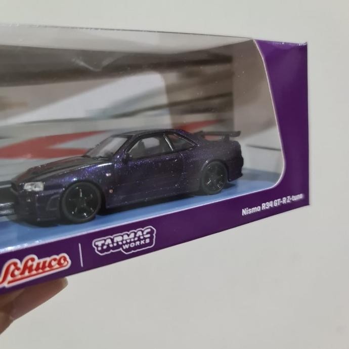 Tarmac works nissan skyline r34 nismo midnight purple 3 schuco