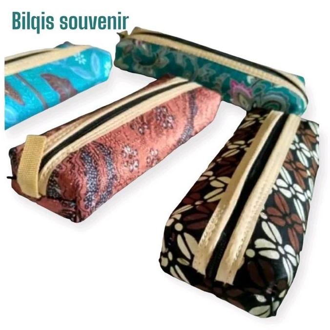 

souvenir pernikahan isi 50 pcs dompet pensil batik Plastik liquid