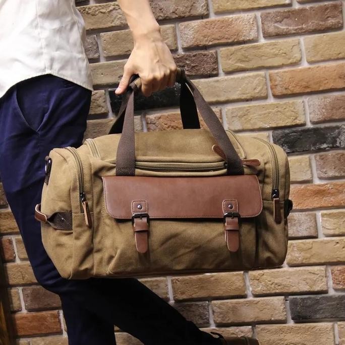 Tersedia Tas travelbag kanvas premium tas pakaian jinjing import tas outdoor