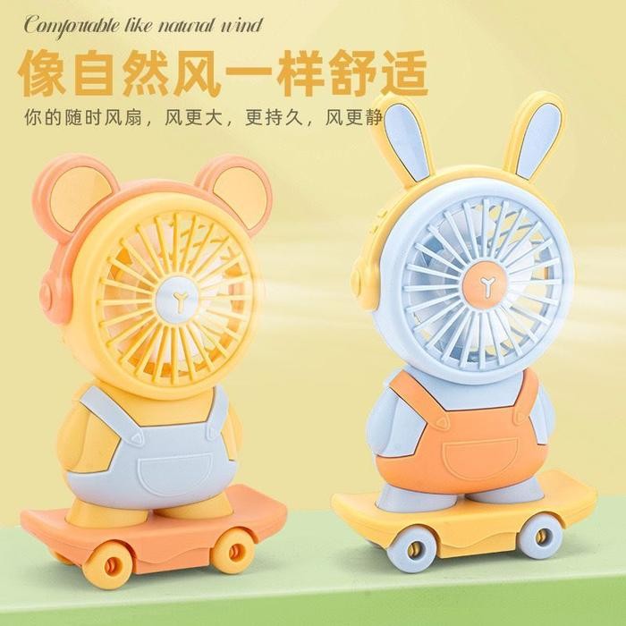 

Kipas Angin Mini Lucu Karakter Skateboard Dengan Rautan Pensil/ Cute Mini Fan Handheld Portable Led