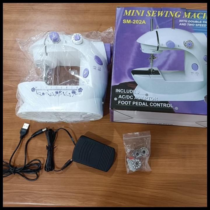 

Terlaris Mesin Jahit Mini Portable 202 Ada Lampu Pemotong Benang Good Quality