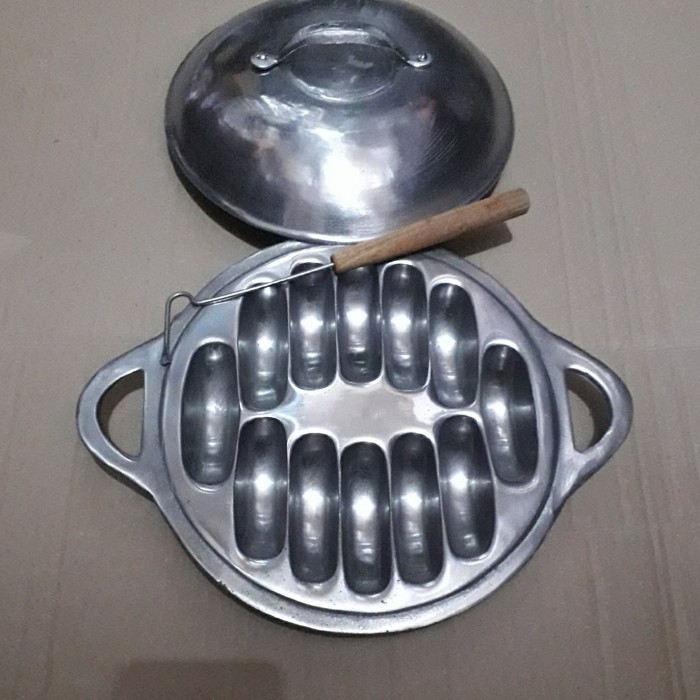 

TERLARIS CETAKAN KUE PUKIS PANCONG PARABOLA KECIL.ISI 12 LUBANG + CUNGKILAN
