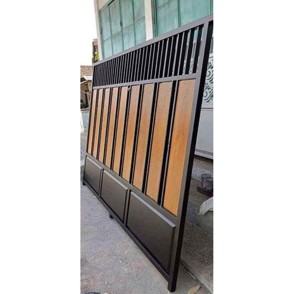 pagar besi motif kayu