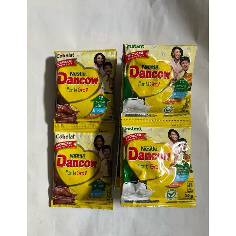 

susu bubuk dancow renteng isi 10 sachet nUg