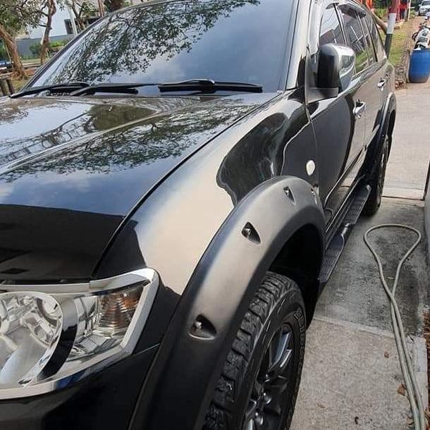 over fender Pajero sport lama