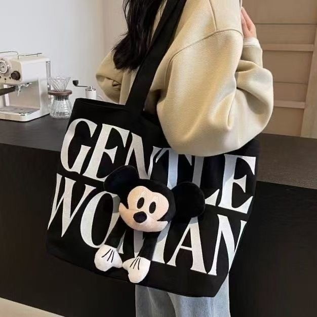 Tas jinjing kanvas berkapasitas besar untuk wanita dengan motif kartun Mickey Mouse