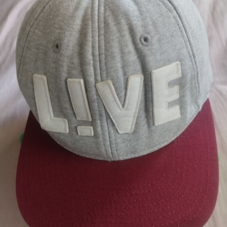 Topi Lacoste