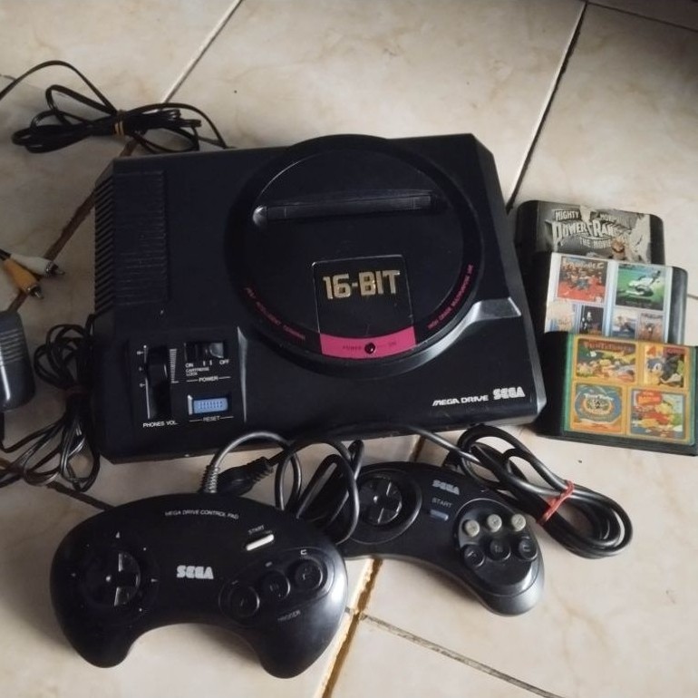 sega md1 original siap main , kabel av sudah tersambung , kaset sesuai foto