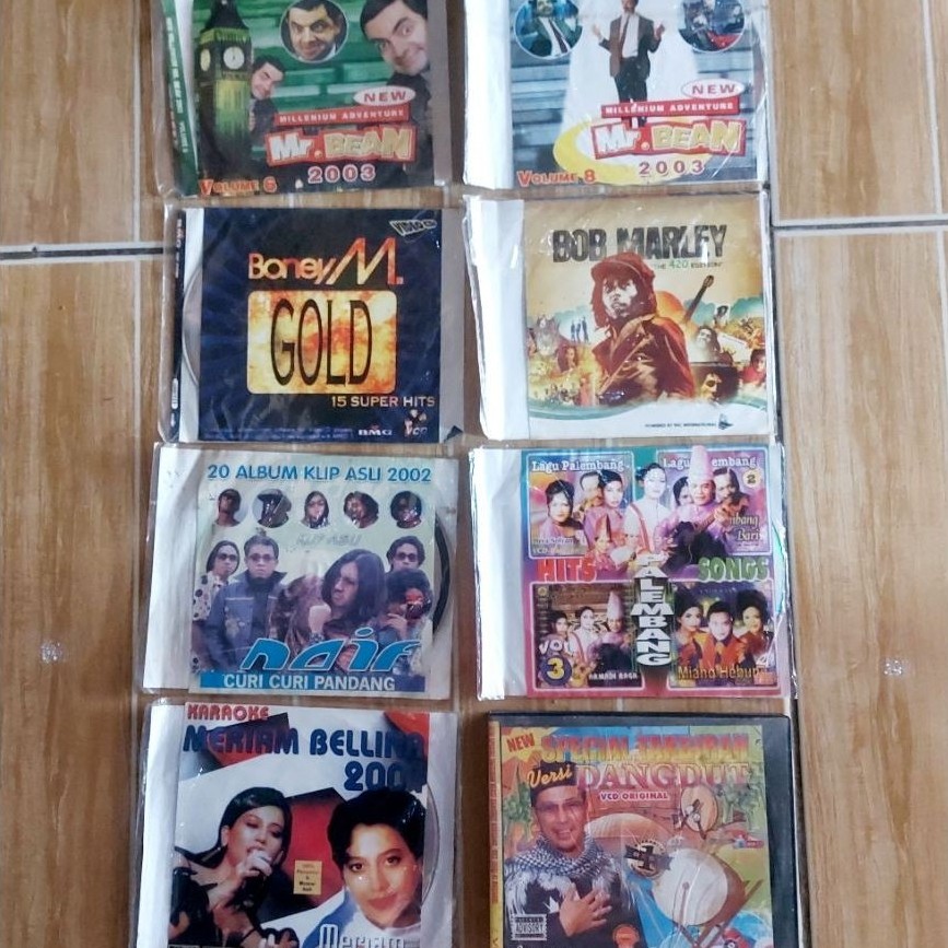 Koleksi CD Audio Mr. Bean 2003 Boney M. Gold Bob Marley dan Lagu Pop Indonesia