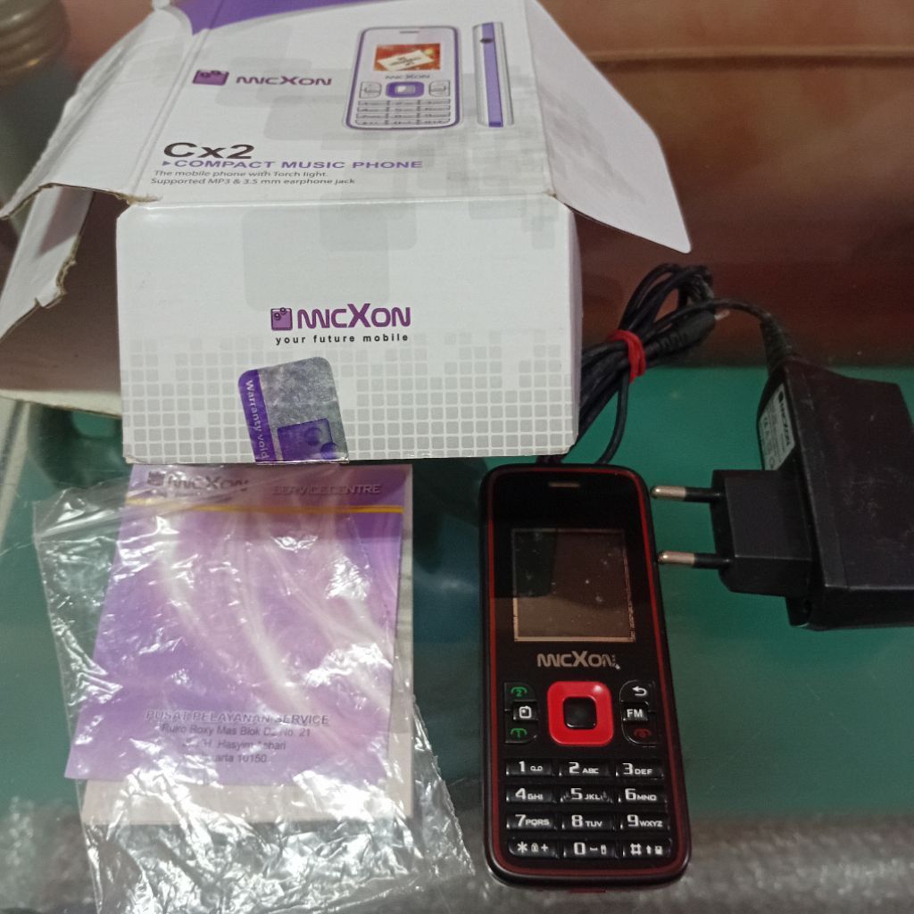 MicXon Cx2 Compact Music Phone HP analog dengan lampu sorot MP3 Rusak