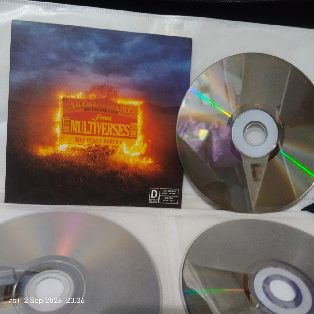CD compact disc_ Feast // Multiverses Original
