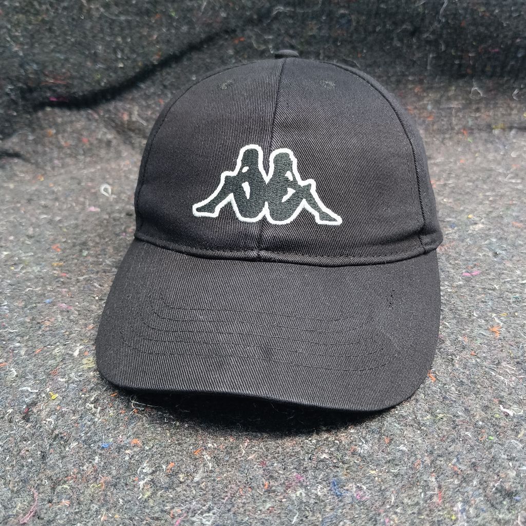 Topi Kappa Market jerman