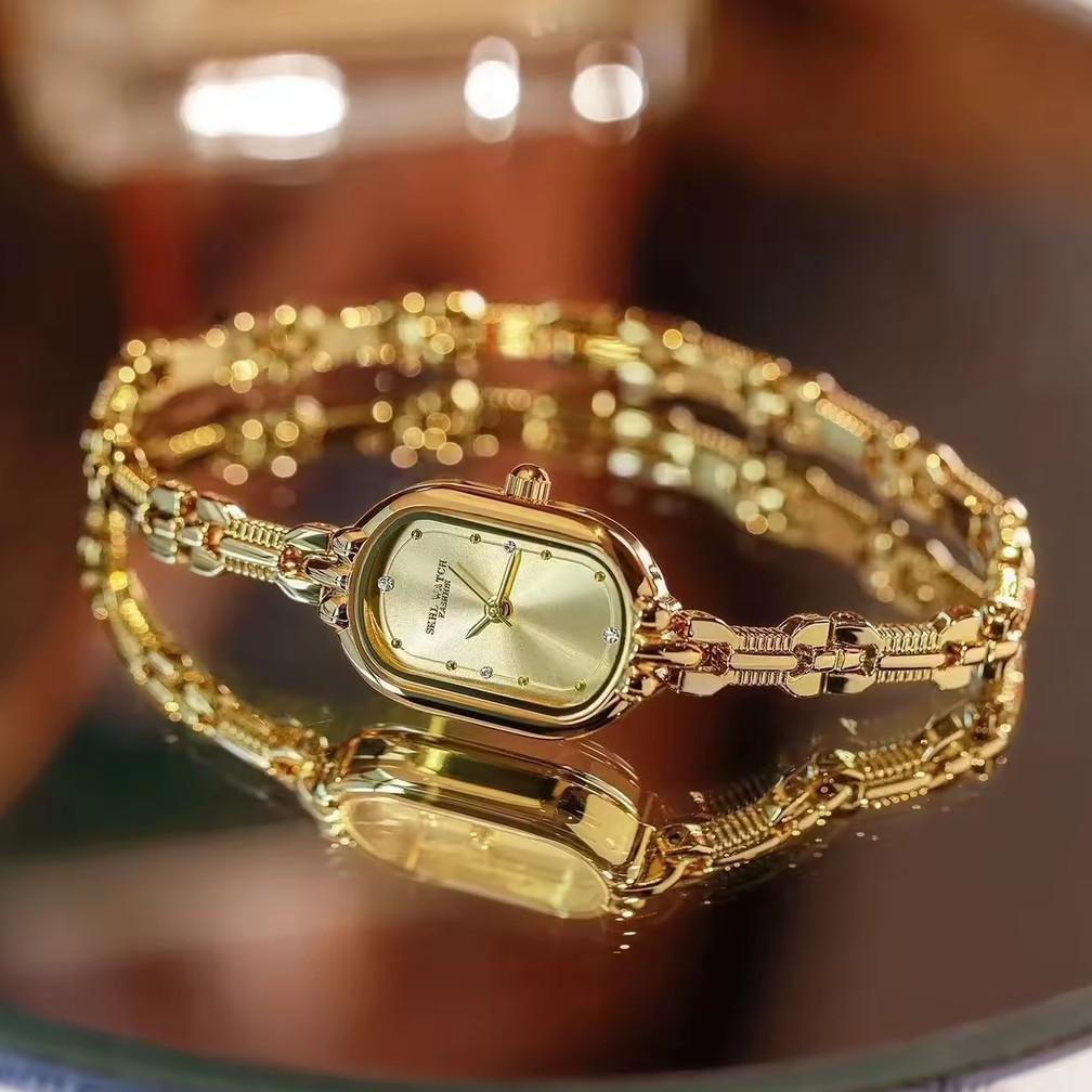 NEW ARRIVAL Jam Tangan +Gelang Wanita Dengan Dial Oval Tali Jam Tangan Berbentuk Gelang Jam Tangan M