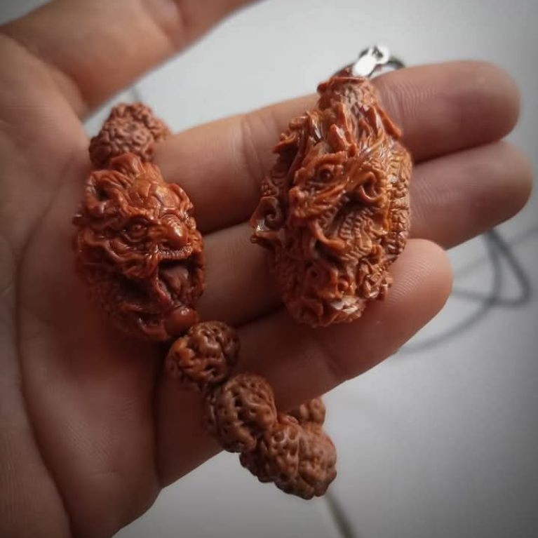 liontin ukirNAGA