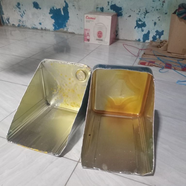 serok sampah bekas kaleng lem