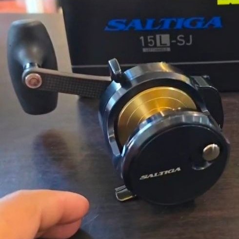 REEL DAIWA SALTIGA 15L SJ second like new original
