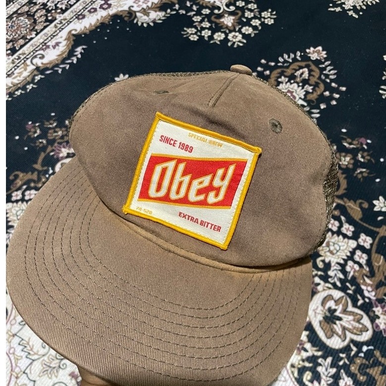 topi obey