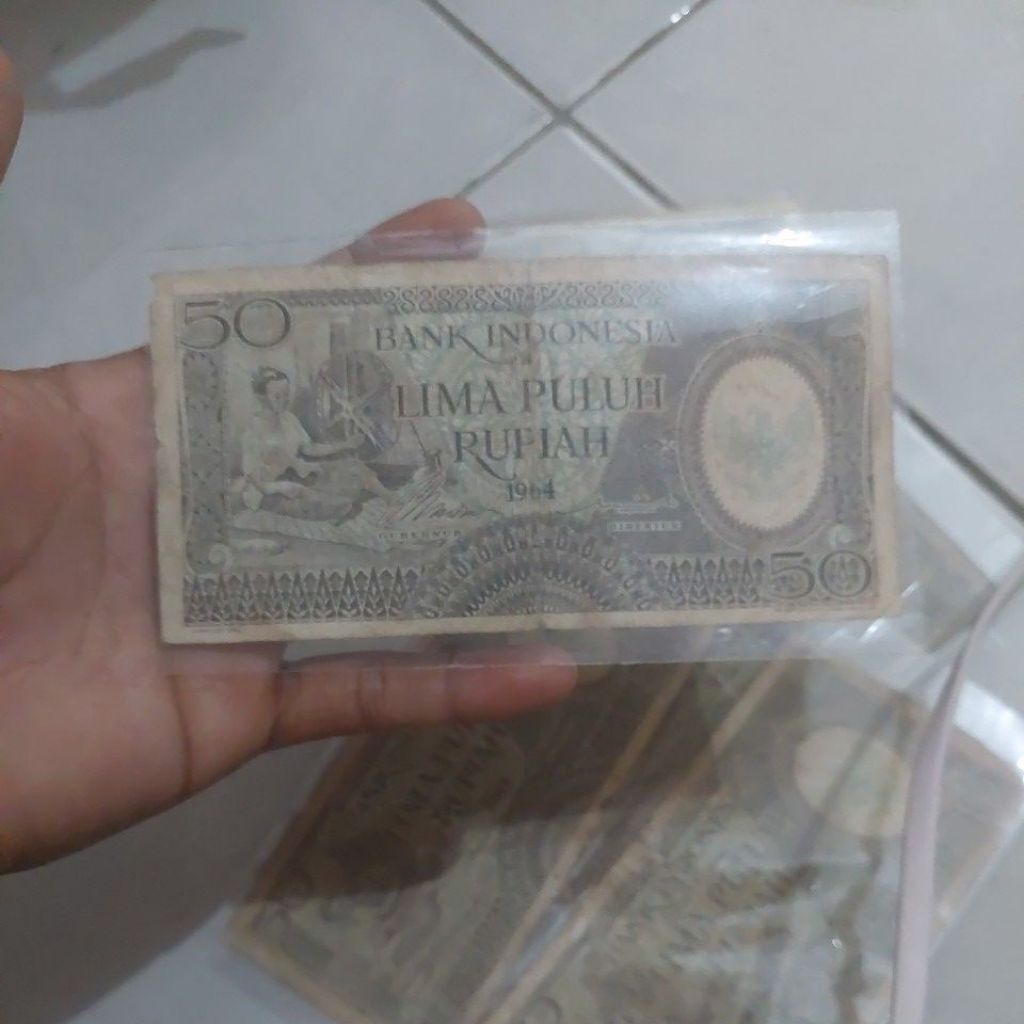 50 rupiah tahun 1964 VF asli.
