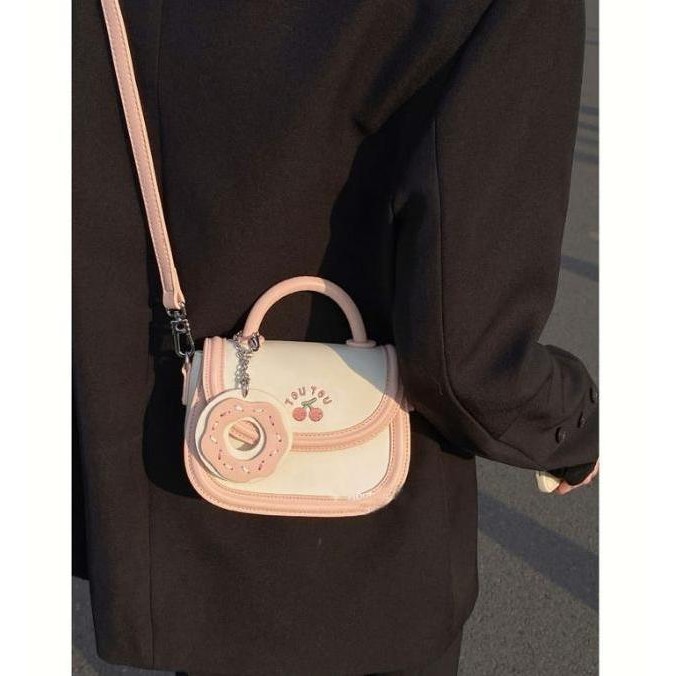 2025 Desain ceruk baru tas donat ceri krim tas tangan tas pelana tas selempang wanita