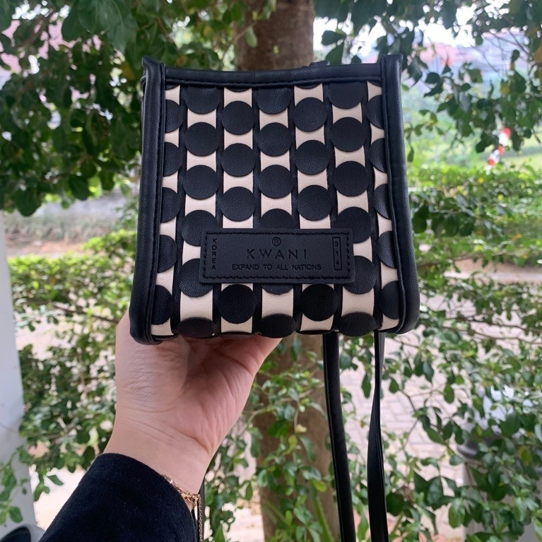 KWANI sling bag