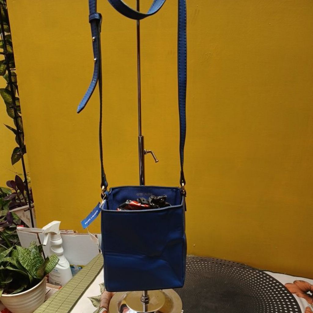 Tas selempang kotak unik estee lauder