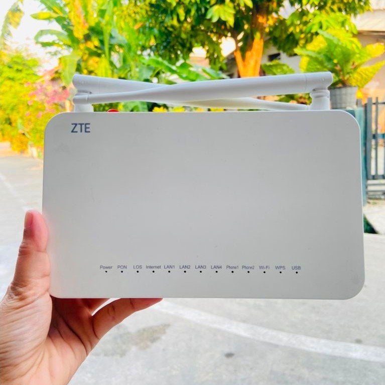 ROUTER ONT ZTE ZXHN F690 DAN ADPTOR 12V GARANSI