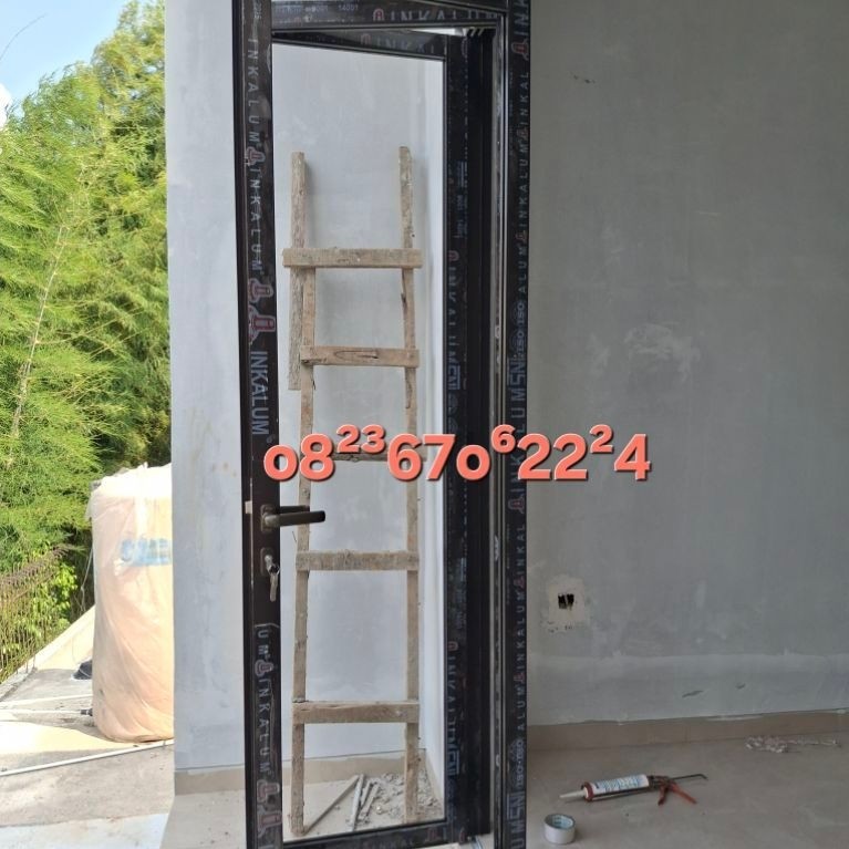 pintu lipat kaca aluminium