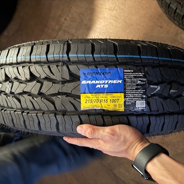 Ban Mobil Dunlop Grandtrek AT5 215/70 R16 Tahun 26
