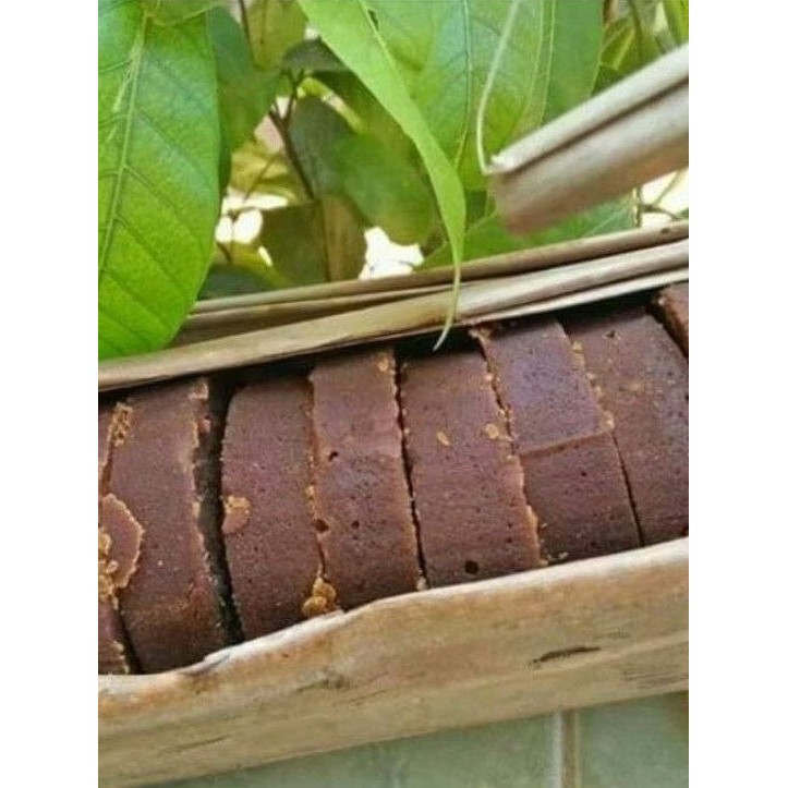 

Gula Aren Asli Bungkus Daun 1 Kg GULA AREN ASLI TAMPA CAMPURAN