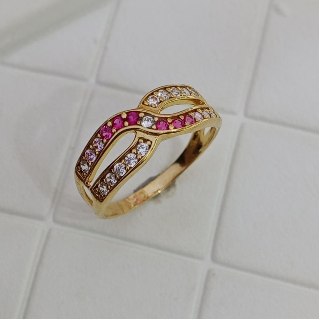Laris Jaya cincin emas kuning mdl listring batu pink silang 6k
