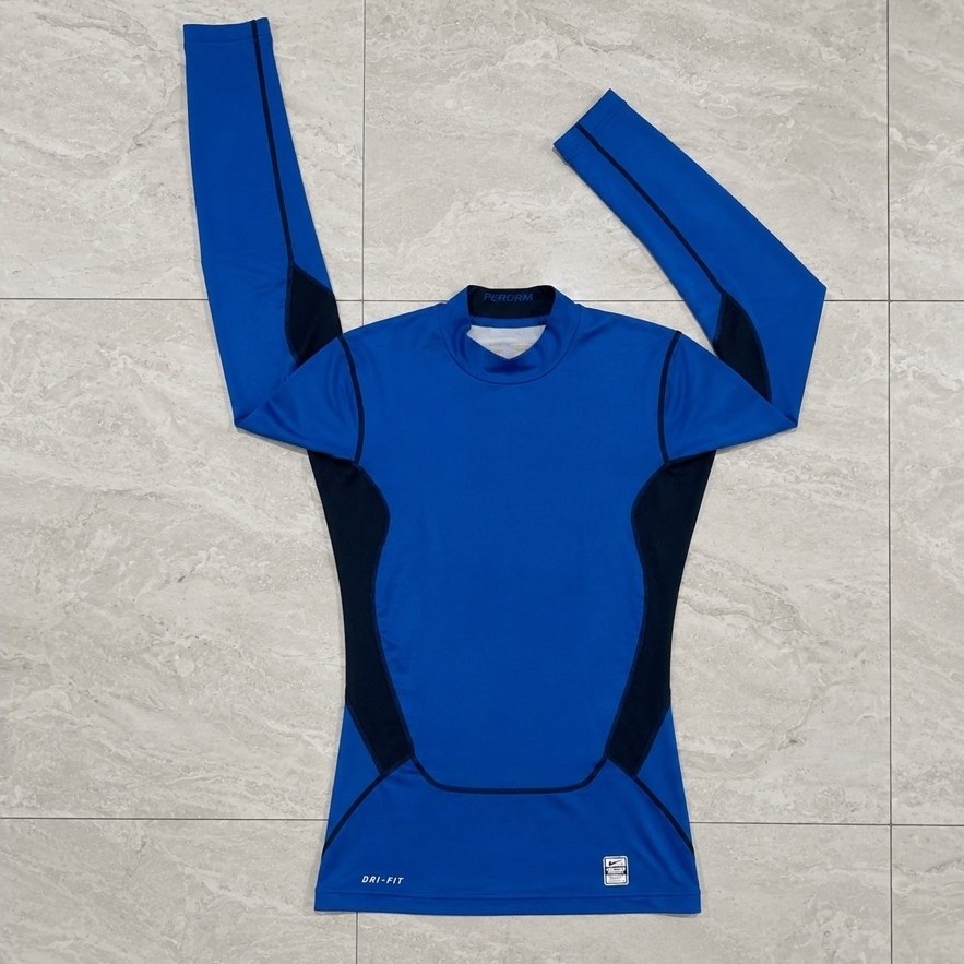 atasan olahraga nike compression biru