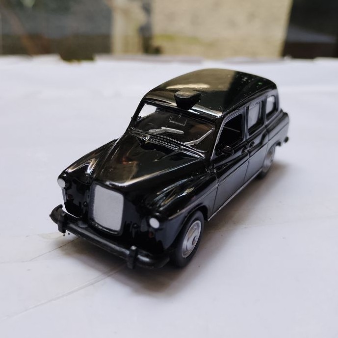 Mobil Diecast Welly Austin Series 1:60 warna hitam mainan bahan besi
