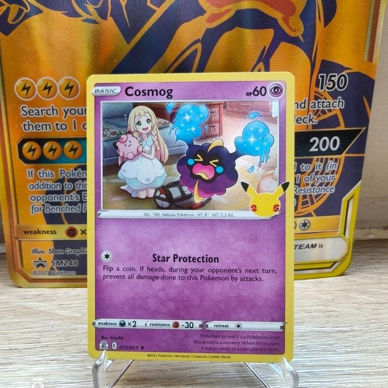Cosmog 013/025 25th Celebrations Eng