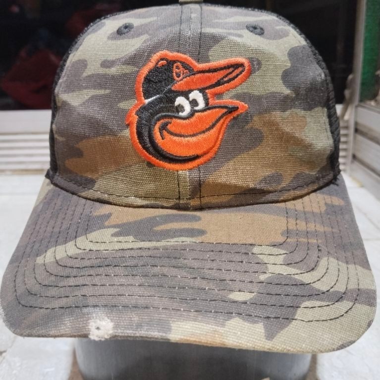 Topi New Era 9FORTY Baltimore Orioles Camo Mesh Trucker Cap Second Original