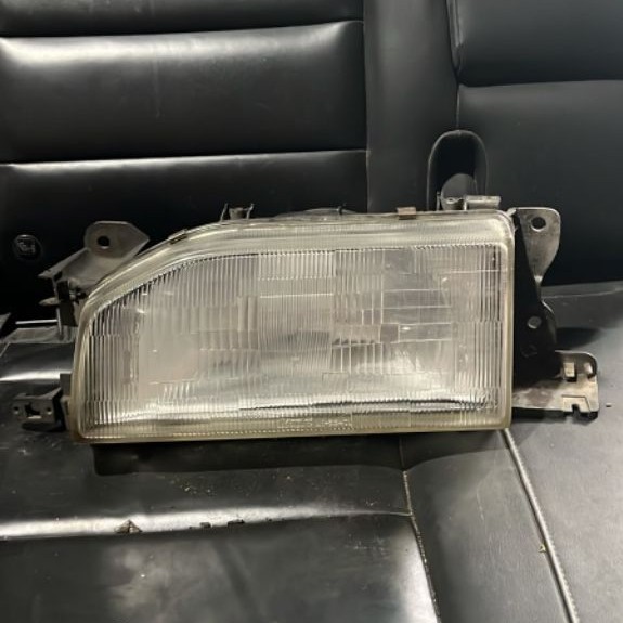 ￼Headlamp lampu depan mazda 323 1988 1989 original