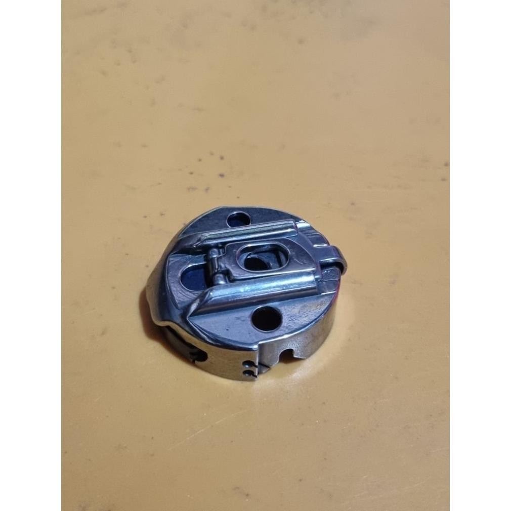 Sekoci mesin jahit lobang kancing otomatis Brother HE800