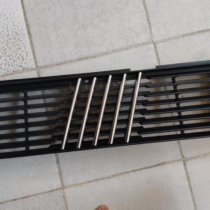 grill depan fiat uno 1