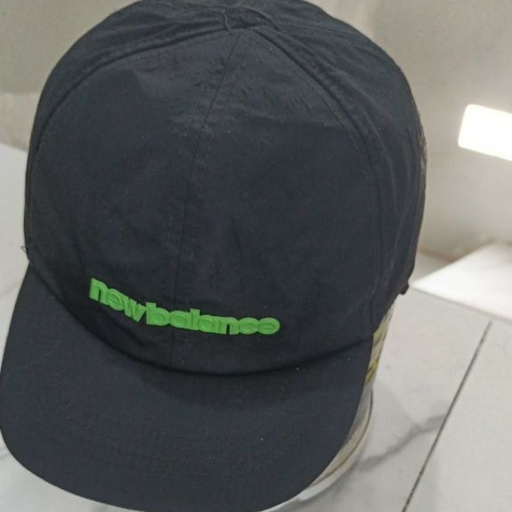 topi running New balance
