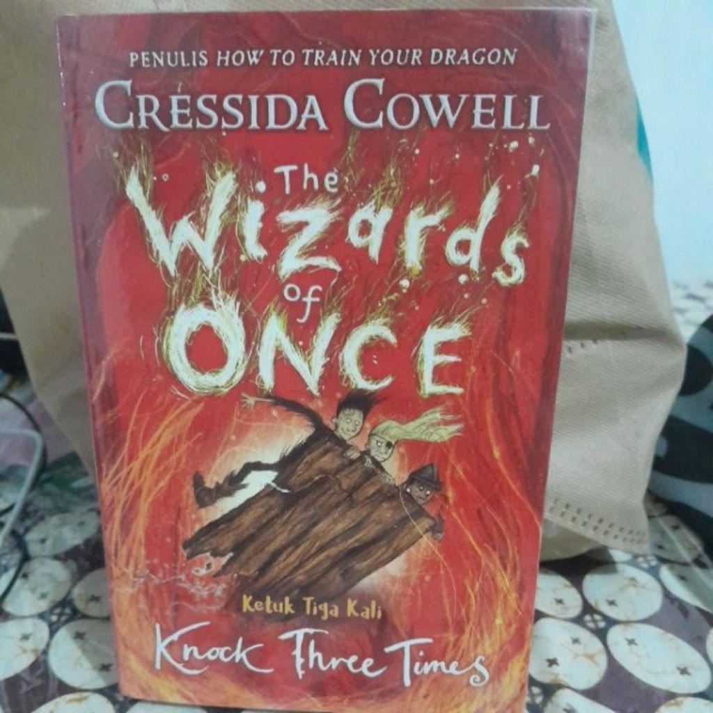 [lihat foto video & deskripsi] preloved buku B Indo Cressida Cowell : Wizards of Once ke 3 Ketuk Tig