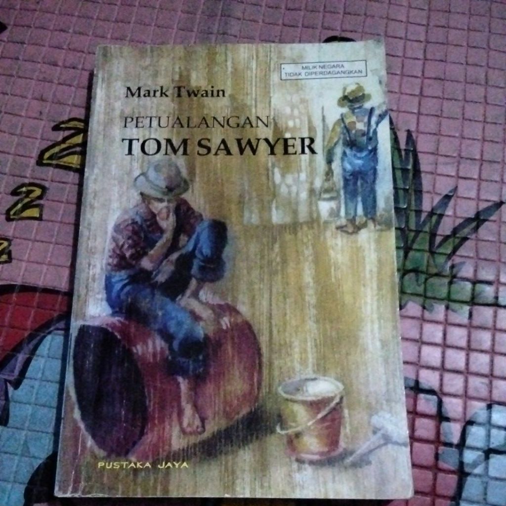 PETUALANGAN TOM SAWYER