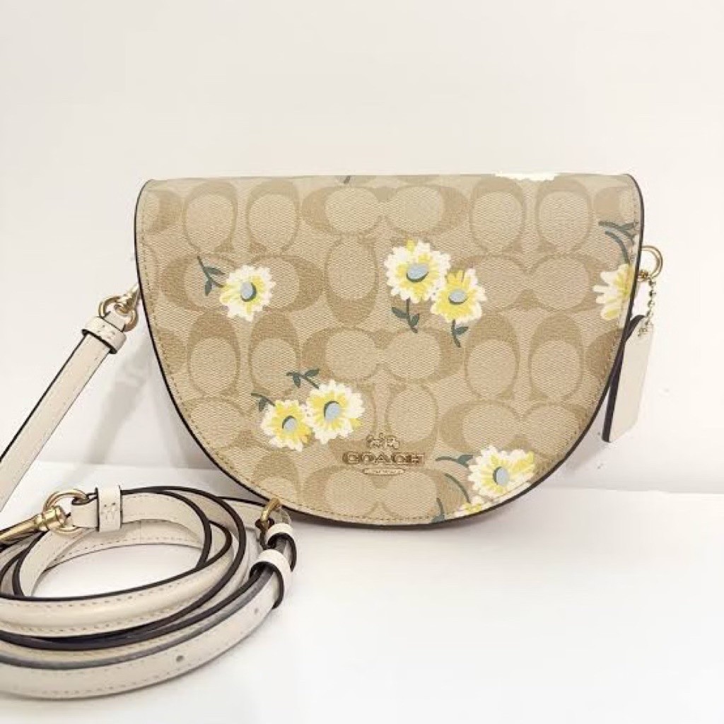 Tas Selempang Wanita COACH Motif Bunga Warna Krem Model Saku Atas dengan Tali Panjang