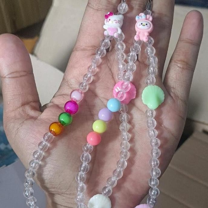 

GANTUNGAN HP MOTE KARAKTER LABUBU PITA Lanyard