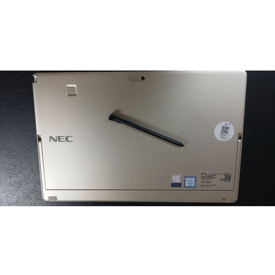 Laptop NEC warna silver dengan stylus, perangkat tablet PC Windows